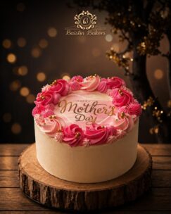 Elegant Mother’s Day cake with pink cream floral decoration by Baistin Bakers By Cake House