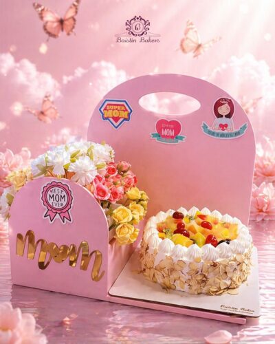 Mother’s Day fruit cake gift combo with flowers and luxury packaging by Baistin Bakers By Cake House