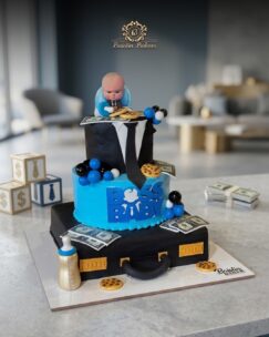 Boss Baby theme birthday cake with luxury fondant decorations by Baistin Bakers By Cake House