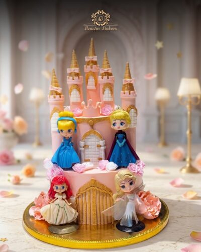 Princess castle theme birthday cake with princess figurines by Baistin Bakers By Cake House