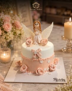Elegant pastel angel princess cake with wings and floral decorations