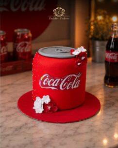 Red Coca Cola can inspired designer birthday cake with floral decorations