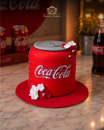Red Coca Cola can inspired designer birthday cake with floral decorations