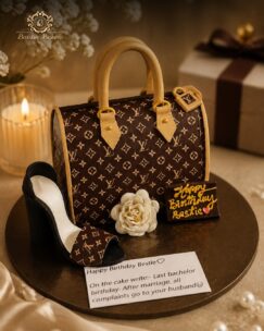 Luxury handbag birthday cake with designer purse styling, matching high heel, and premium fashion-themed decorations.