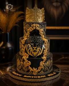 Black and gold luxury birthday cake featuring a royal crown