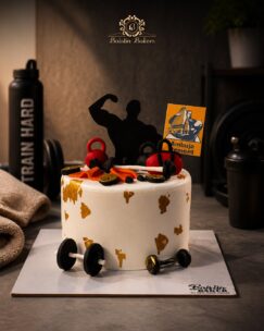 Customized gym theme birthday cake decorated with dumbbells