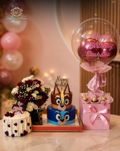 Luxury birthday combo featuring cakes, flowers, chocolates, and personalized balloon arrangement.