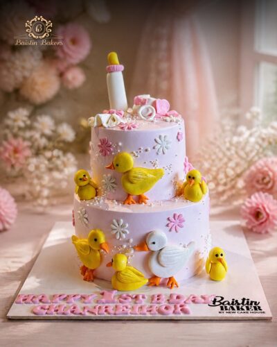 Cute duck theme first birthday cake for baby celebrations by Baistin Bakers Jalandhar